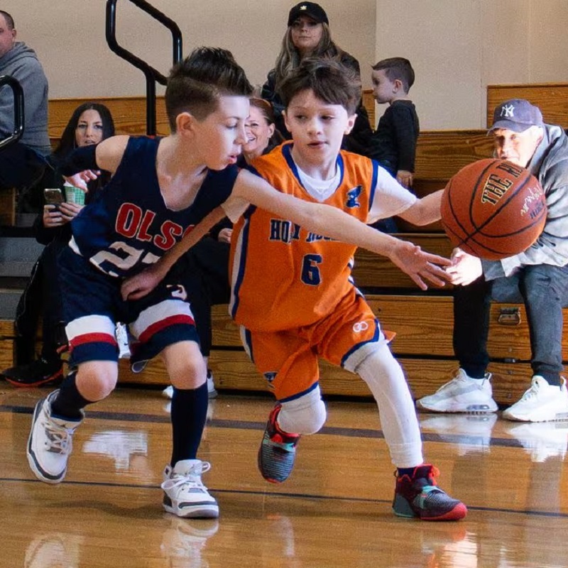 boys are playing basketball